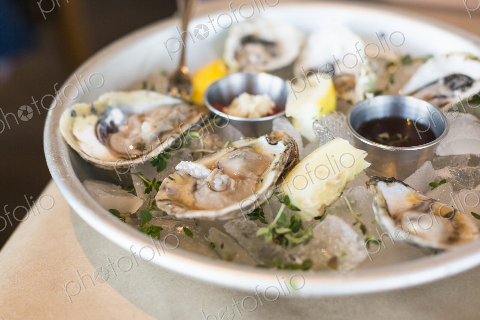Close up of a plate of fresh oysters.