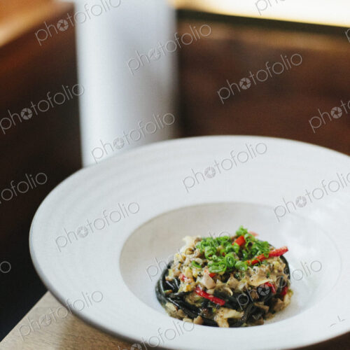 Close up of a plate of freshly prepared vegetables, an elegantly presented dish