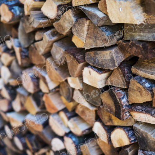 Close up of a stack of firewood logs. Close up of a stack of firewood logs.