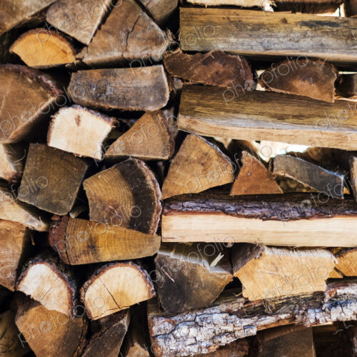 Close up of a stack of firewood logs. Close up of a stack of firewood logs.