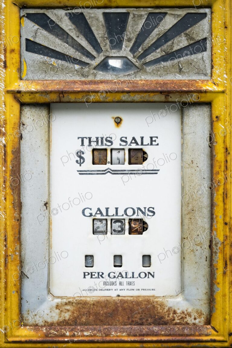 Close-up of a vintage gas pump with rust and faded paint, Oregon. Nostalgic relic of…