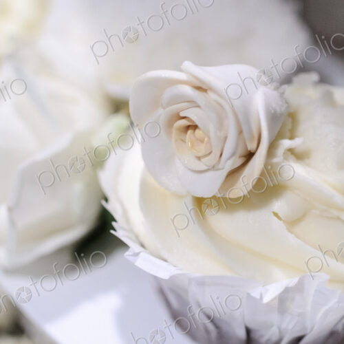 Close up of a wedding cupcake decoration, a suger rose. Close up of a wedding cupcake decoration, a suger rose.