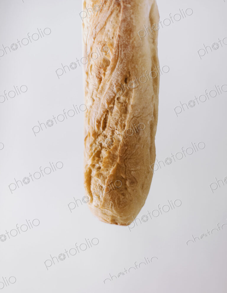 Close up of an organic baked sourdough baguette.