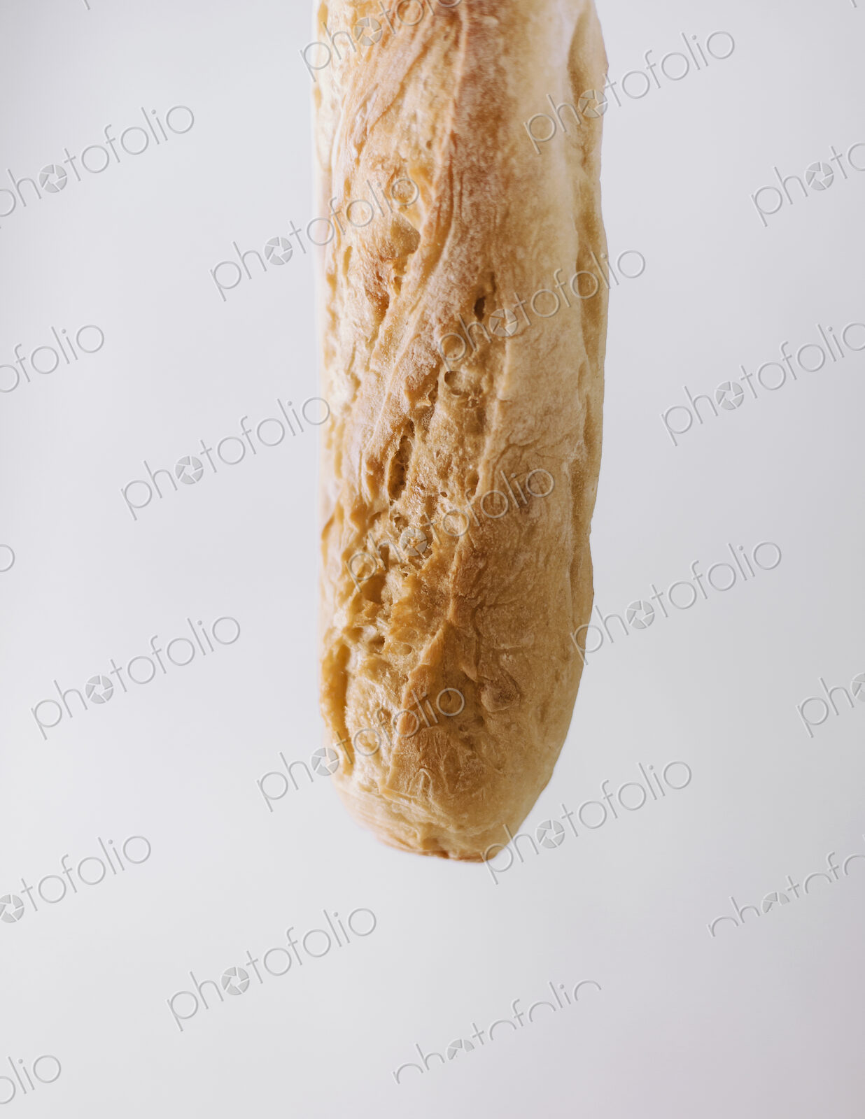 Close up of an organic baked sourdough baguette.