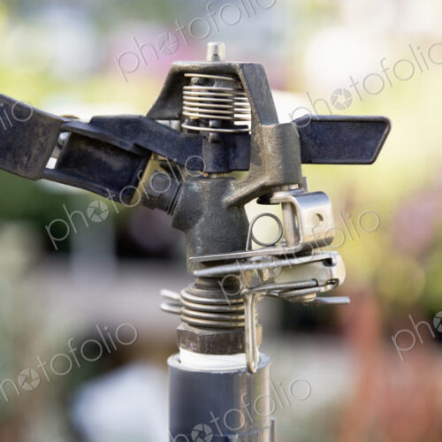 Close up of automated watering spray nozzle. Close up of automated watering spray nozzle.