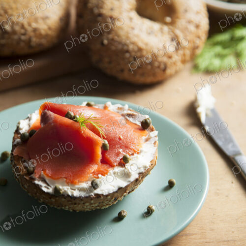 Close up of bagel with cream cheese and lox Close up of bagel with cream cheese and lox