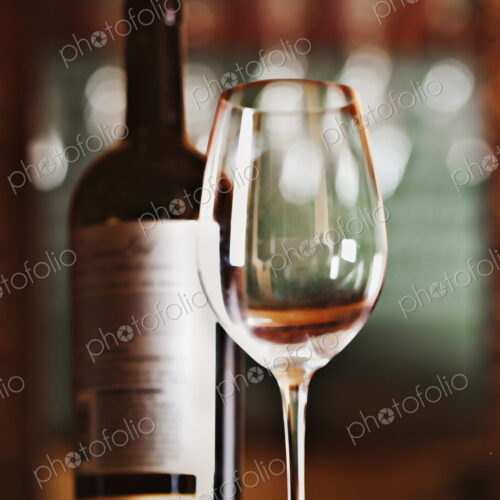 Close up of bottle of wine and glass Close up of bottle of wine and glass