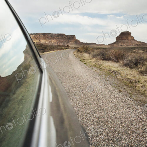 Close up of car window driving through desert landscape, Chaco Canyon, New Mexico,…