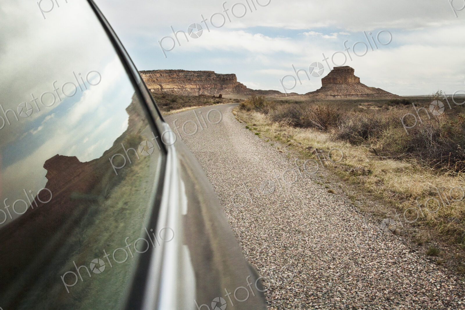 Close up of car window driving through desert landscape, Chaco Canyon, New Mexico,…