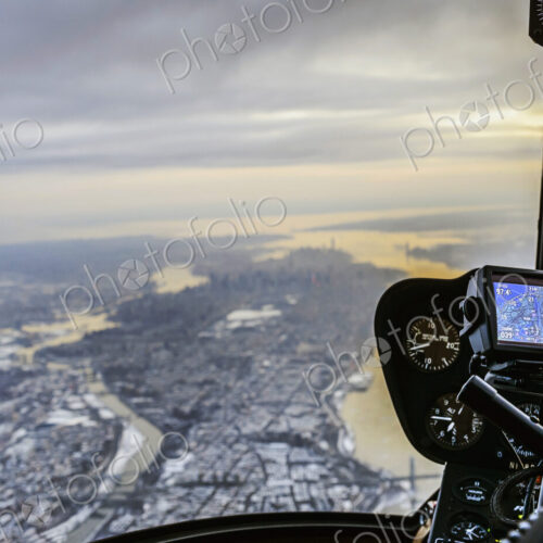 Close up of controls in airplane flying over New York, New York, United States