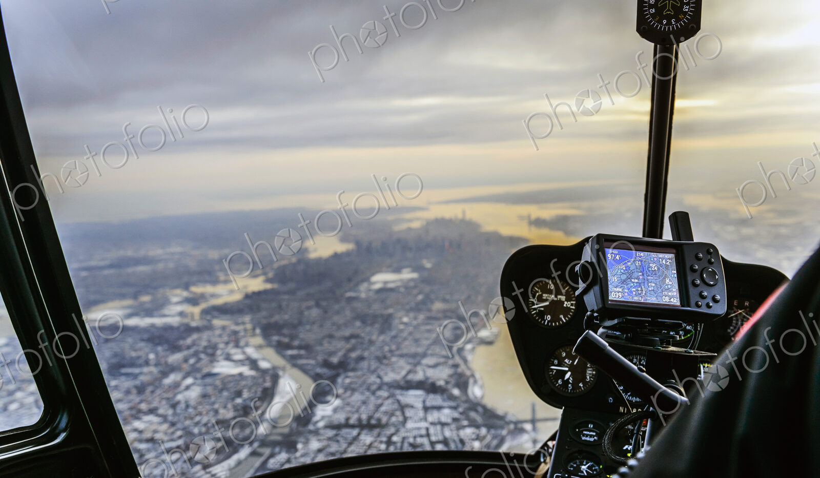 Close up of controls in airplane flying over New York, New York, United States