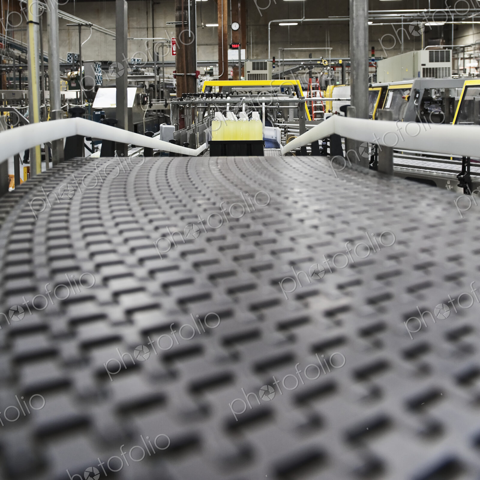 Close up of conveyor belt in bottling plant