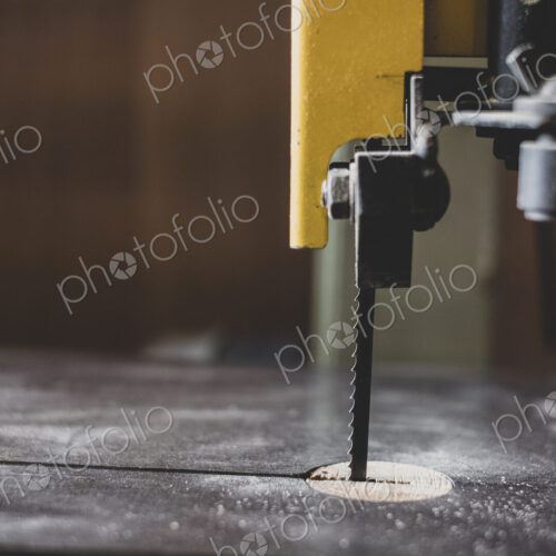 Close up of electric table saw in wood workshop. Close up of electric table saw in wood workshop.