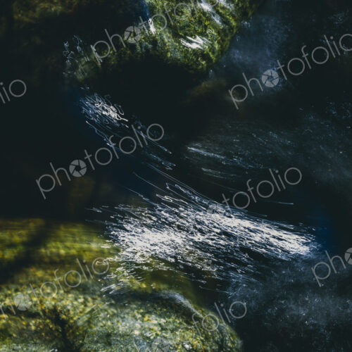 Close up of fast flowing river water, North Fork Snoqualmie River, near North Bend,…