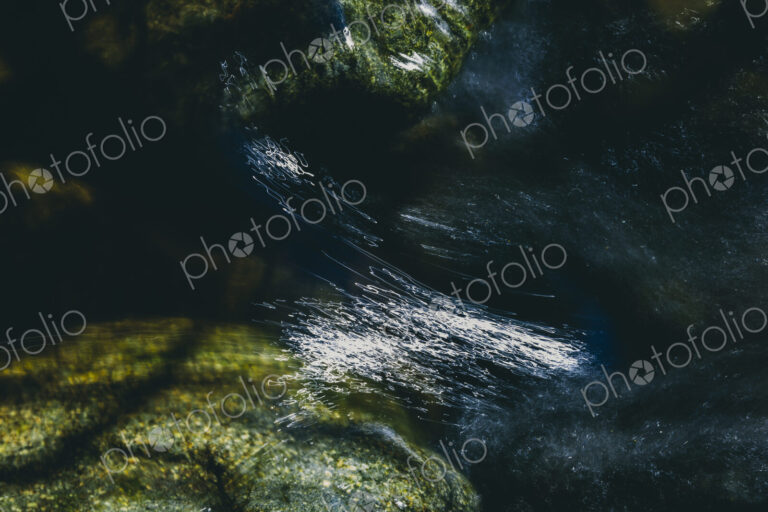 Close up of fast flowing river water, North Fork Snoqualmie River, near North Bend,…