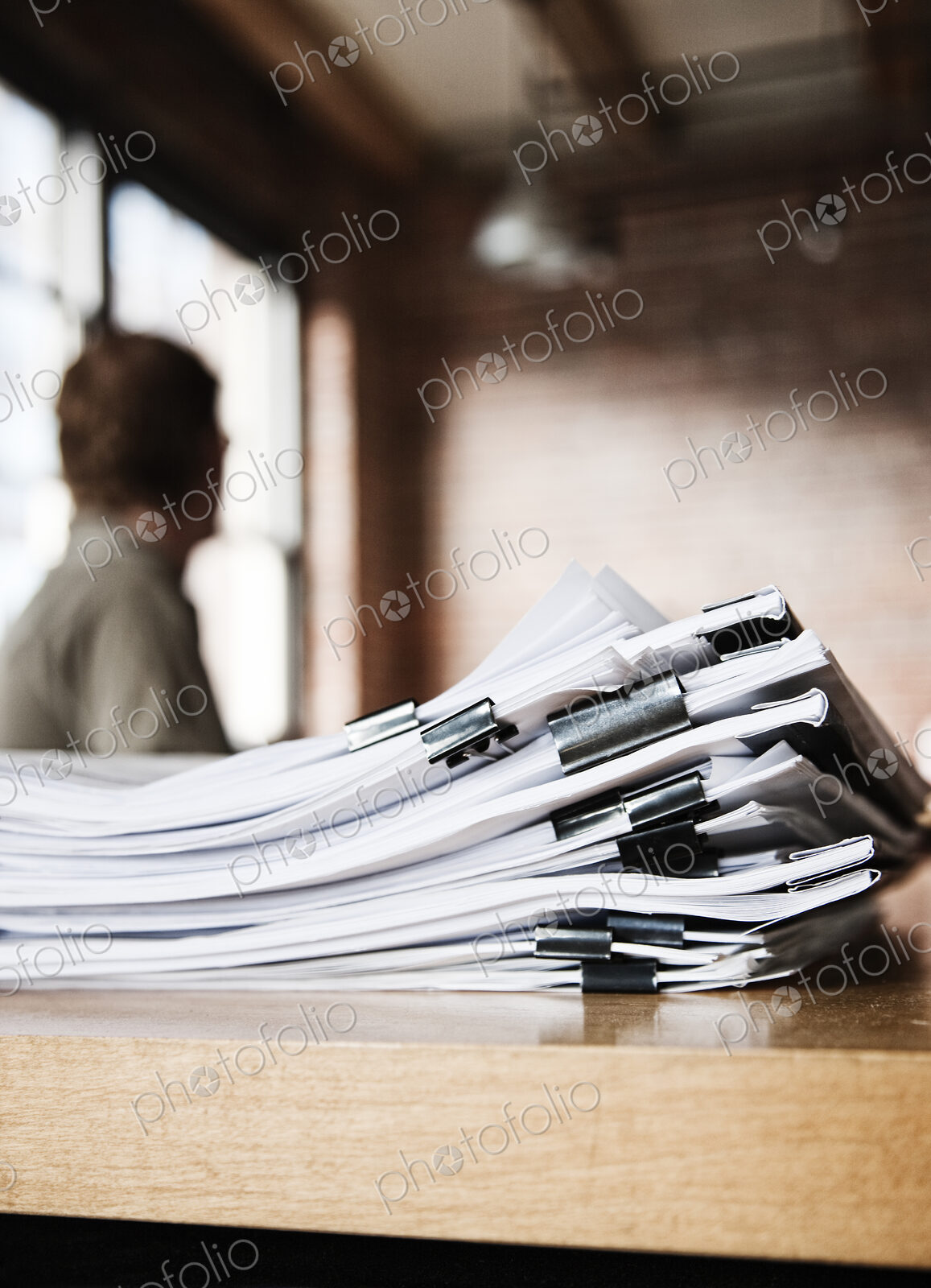 Close-up of files and file folders on a desk top in an office.