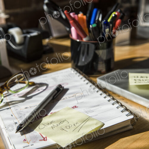 Close-up of files and file folders on a desk top in an office. Close-up of files and file folders on a desk top in an office.