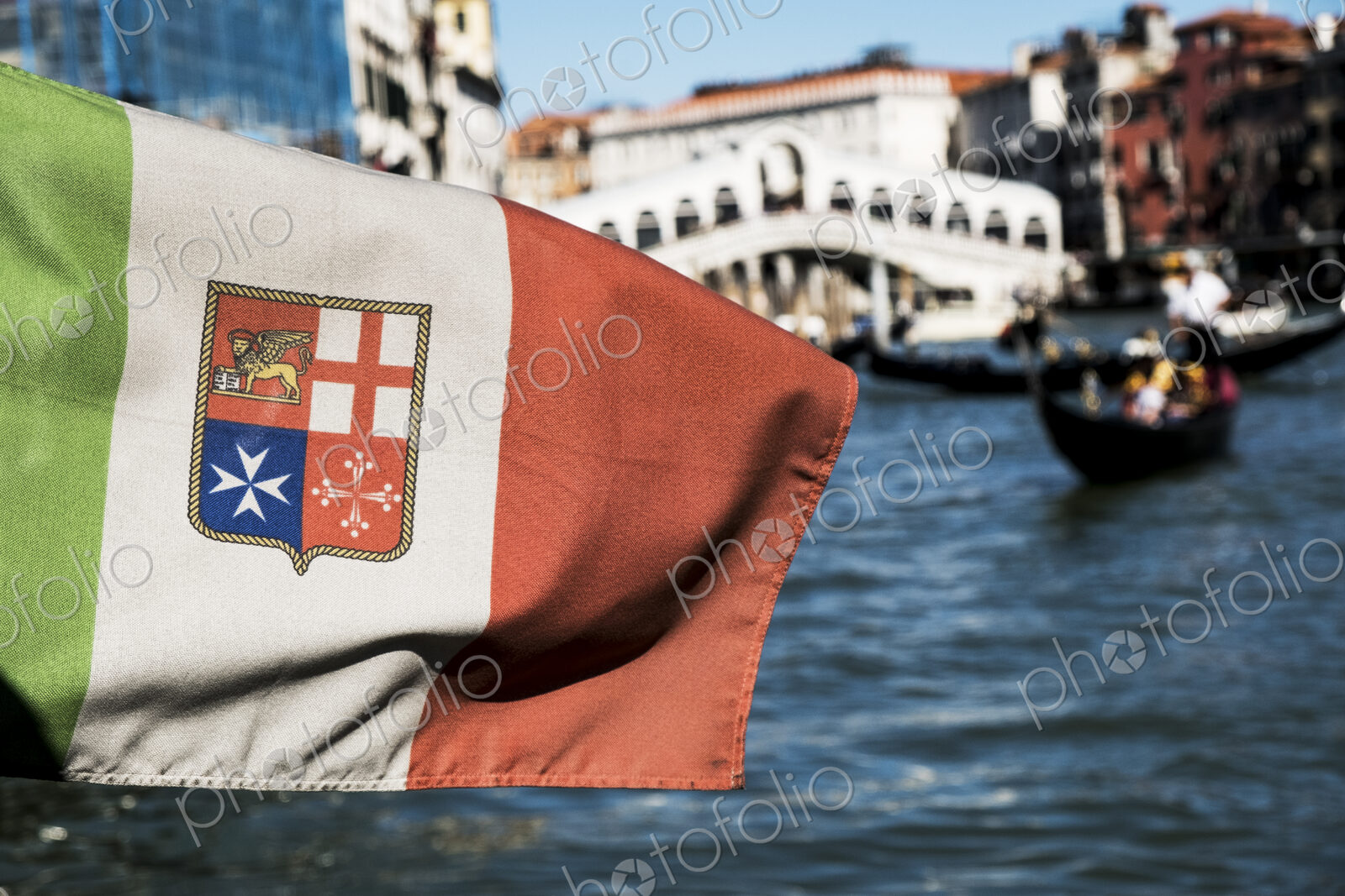 Close up of flag on a gondola on a canal in Venice, Veneto, Italy.