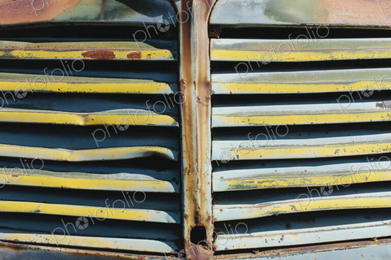 Close up of front grille from abandoned antique truck