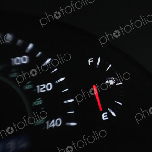 Close up of gas gauge on empty in a car.