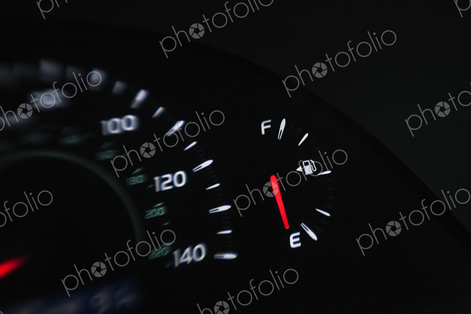 Close up of gas gauge on empty in a car.