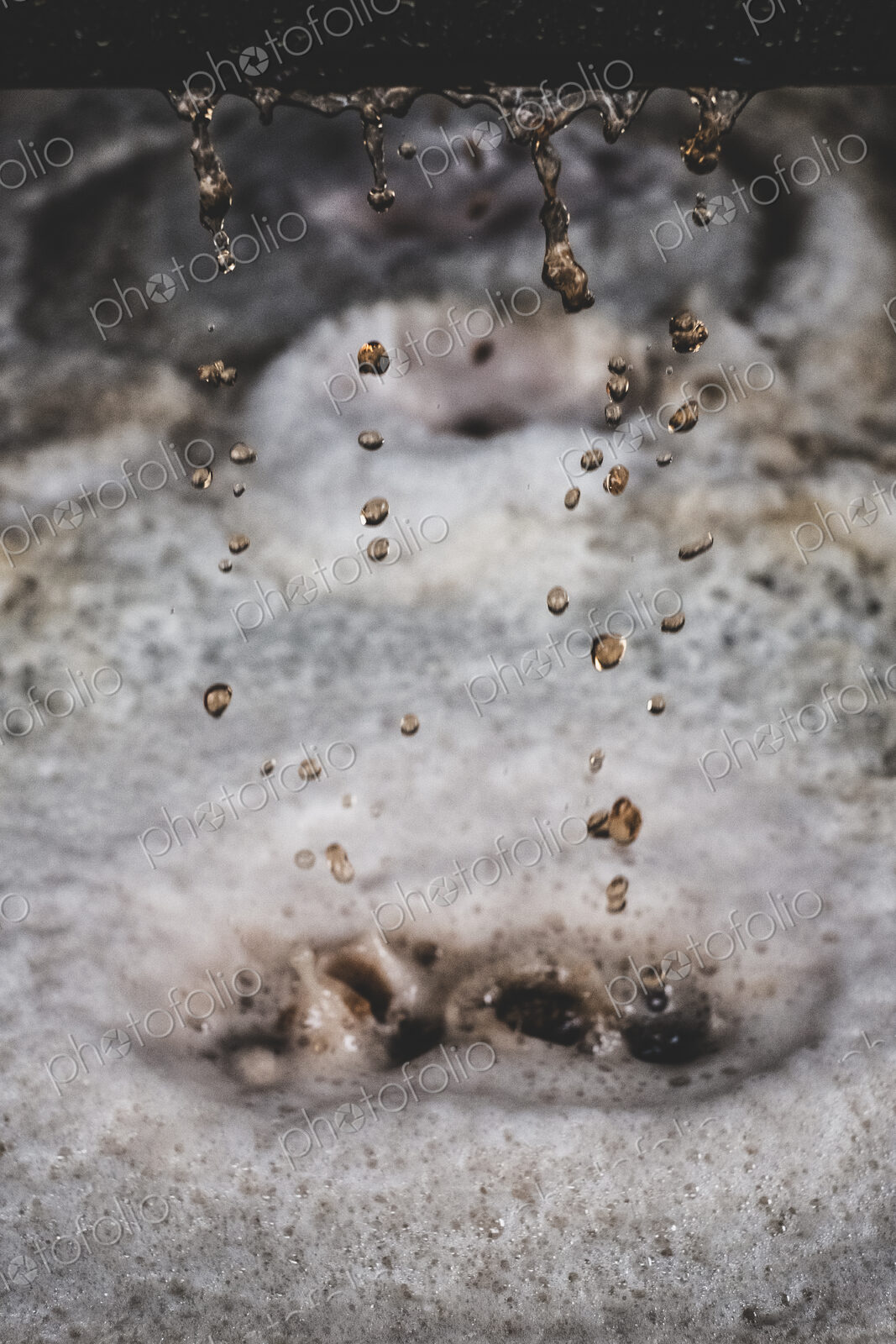 Close up of grape juice in a vat in a winery.