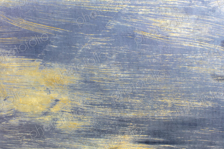 Close up of grey metallic paint on metal