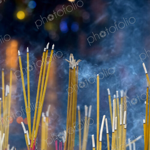 Close up of incense sticks burning Close up of incense sticks burning