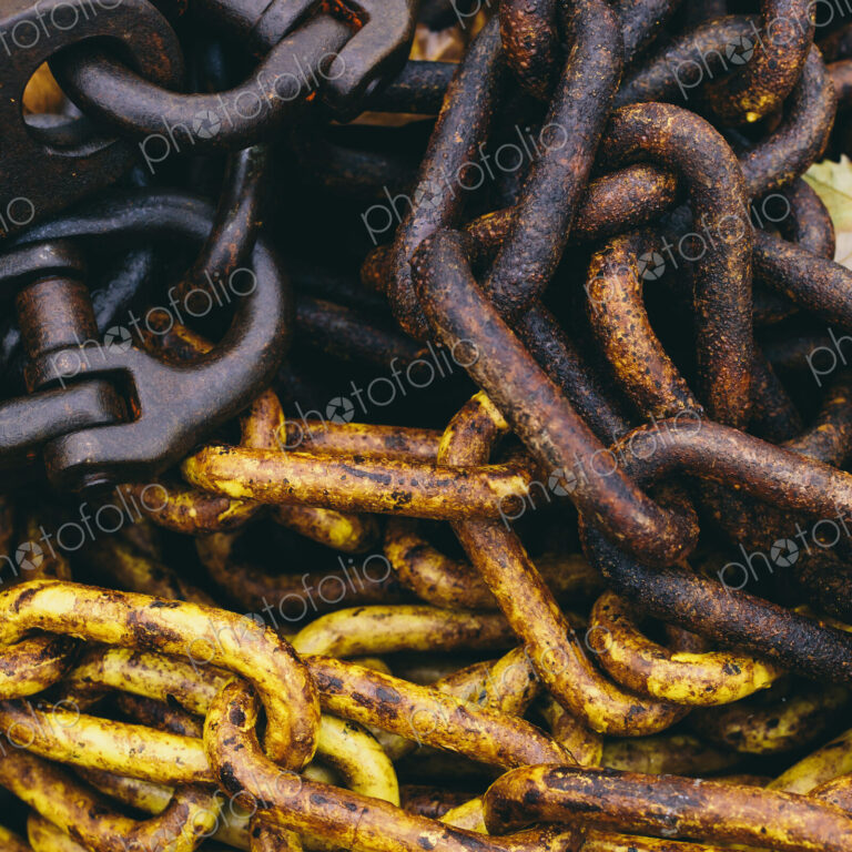 Close up of industrial chains in a heap.