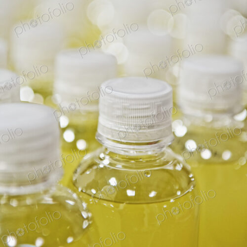 Close up of juice in plastic bottles Close up of juice in plastic bottles