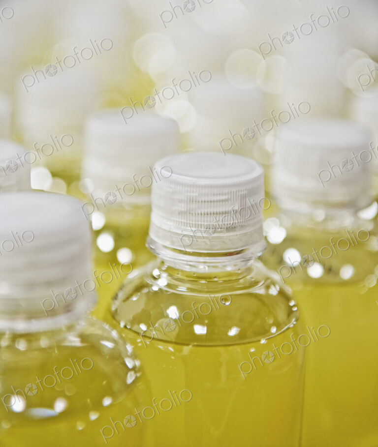 Close up of juice in plastic bottles