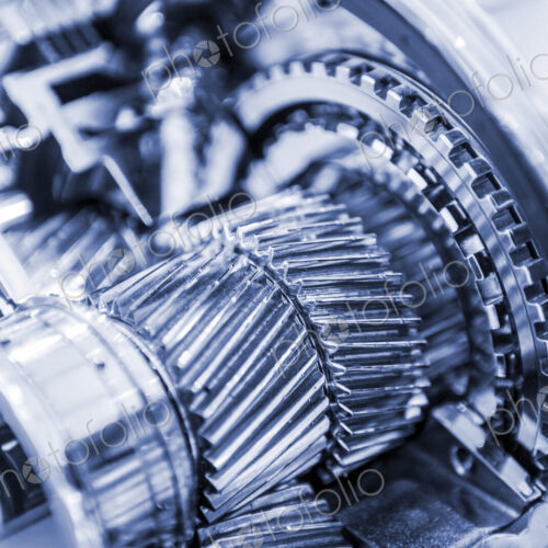 Close up of metal gear inside industrial machinery. Close up of metal gear inside industrial machinery.