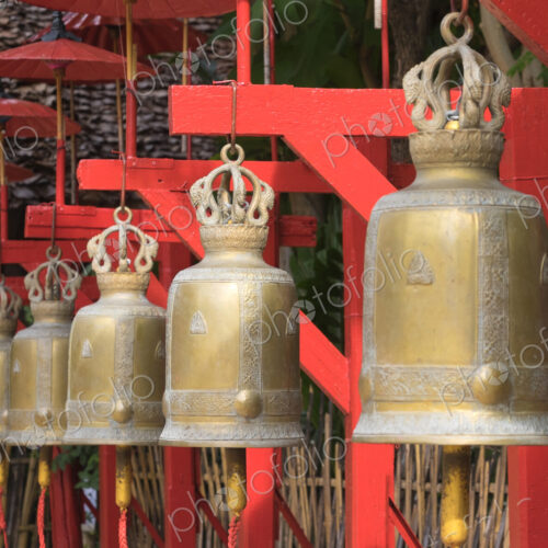 Close up of ornate bells hanging outside temple, Chiang Mai, Chiang Mai, Thailand