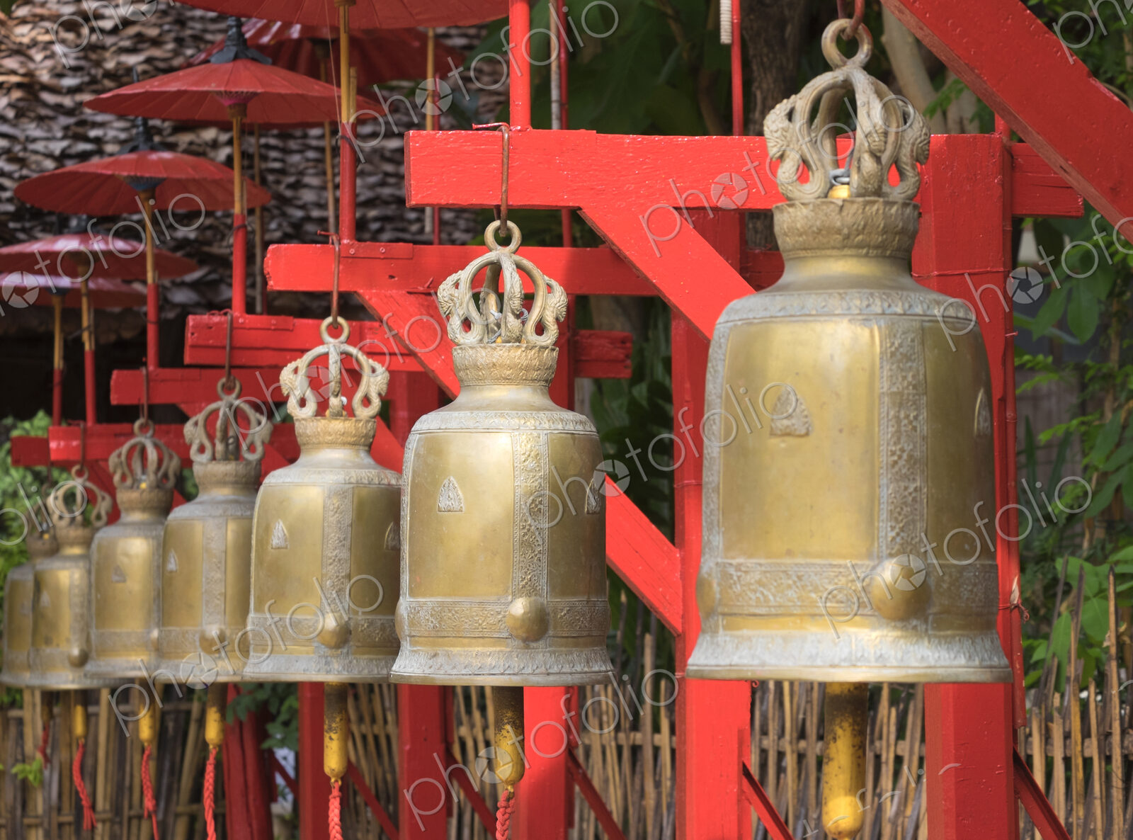 Close up of ornate bells hanging outside temple, Chiang Mai, Chiang Mai, Thailand