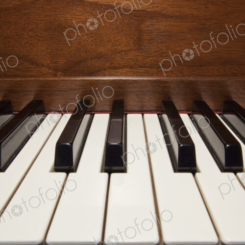 Close up of piano keys.