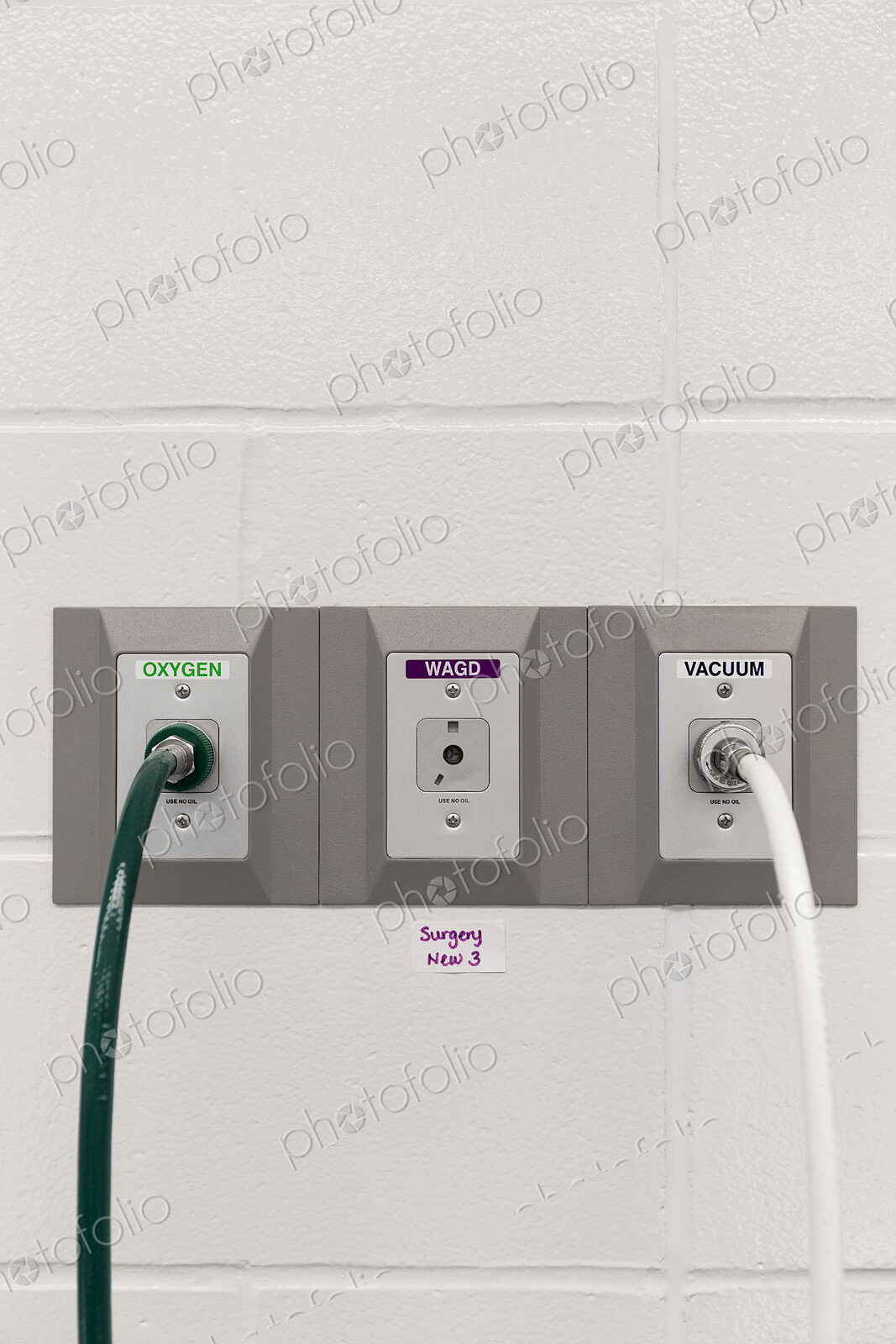 Close up of plugs in wall at animal shelter