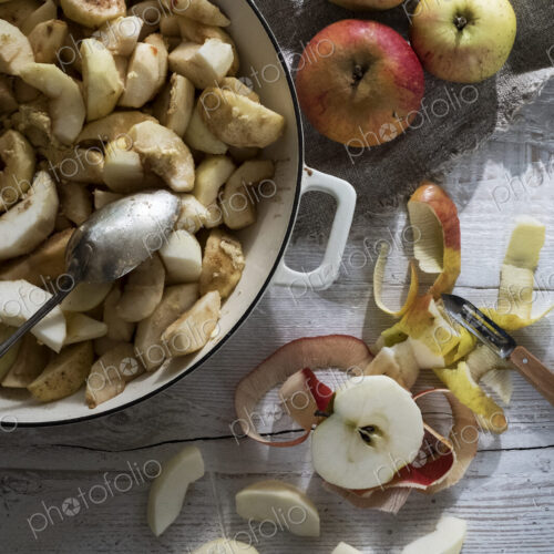 Close up of round baking tin with apple slices. Close up of round baking tin with apple slices.