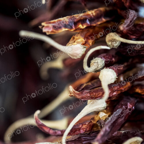Close up of small bunch of dried red chilies. Close up of small bunch of dried red chilies.