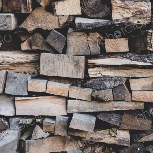 Close up of stack of wooden logs. Close up of stack of wooden logs.