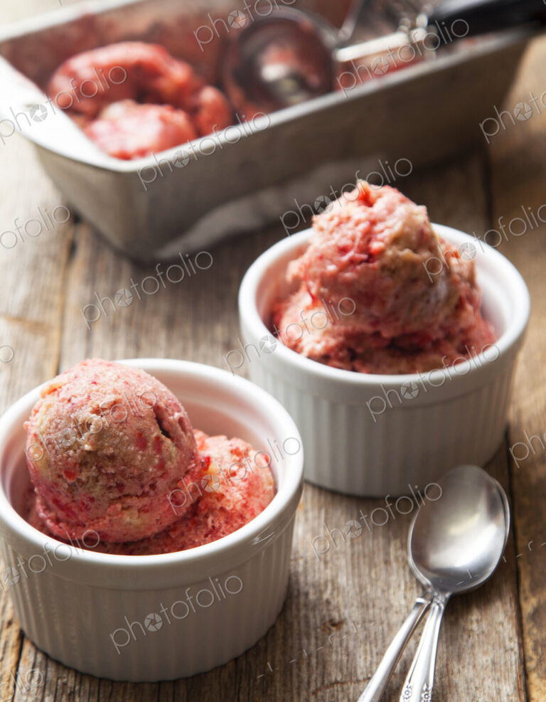 Close up of strawberry ice cream bowls