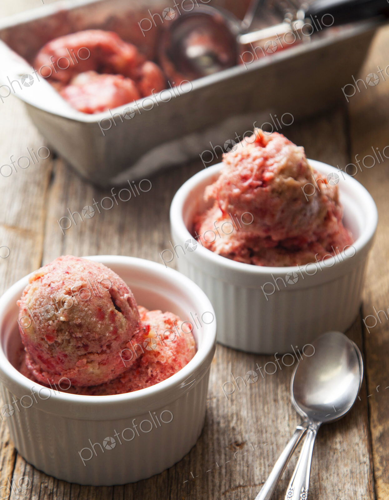 Close up of strawberry ice cream bowls