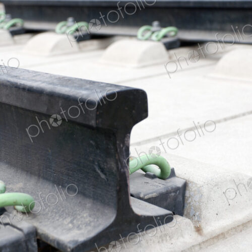Close up of the metalwork of railway tracks, pinions and sleepers. Close up of the metalwork of railway tracks, pinions and sleepers.