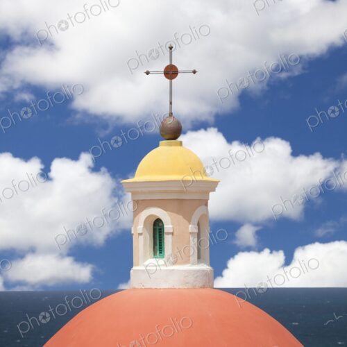 Close-up of the vibrant red dome and yellow cupola of the neoclassical rotunda at… Close-up of the vibrant red dome and yellow cupola of the neoclassical rotunda at…