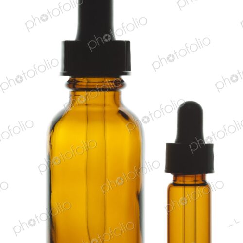 Close-up of two dropper bottles, often used to dispense alternative medicine… Close-up of two dropper bottles, often used to dispense alternative medicine…