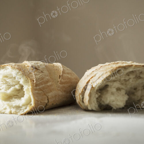 Close up of two freshly baked loaves of bread. Close up of two freshly baked loaves of bread.