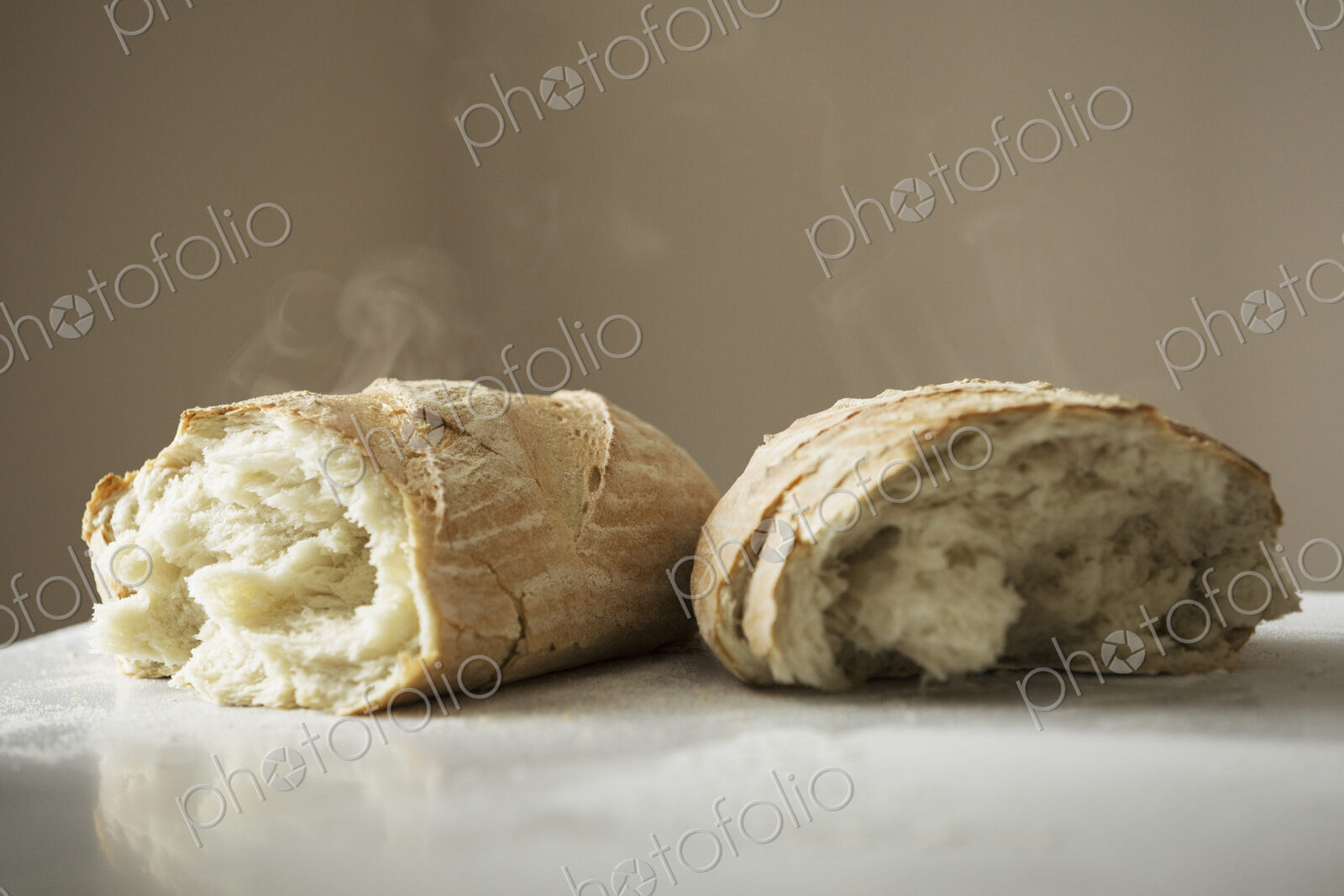Close up of two freshly baked loaves of bread.
