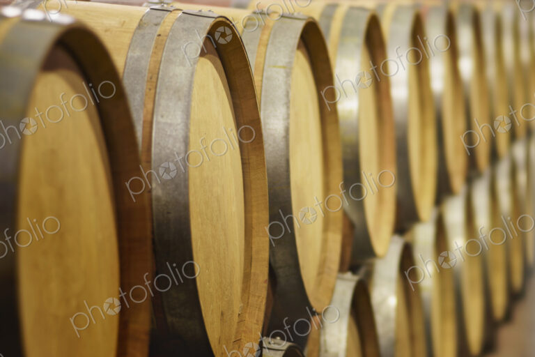 Close up of wine barrels in cellar