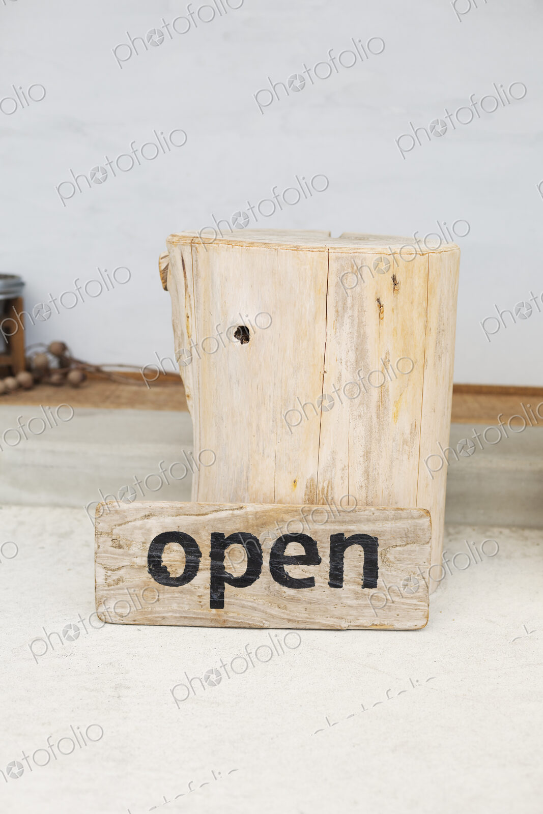 Close up of wooden Open sign in a vegetarian cafe.