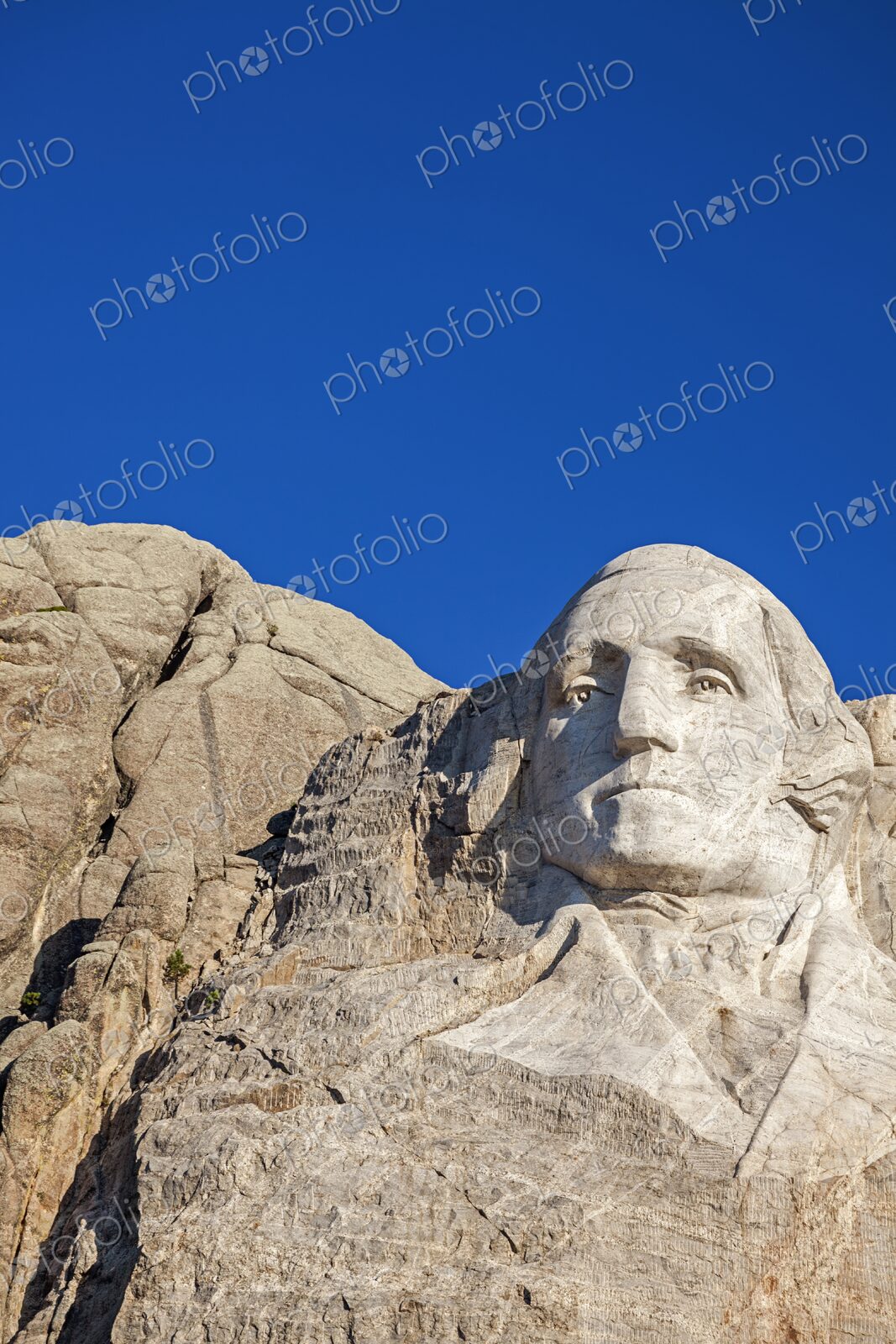 Close view of George Washington carved in granite at Mount Rushmore National Memorial…