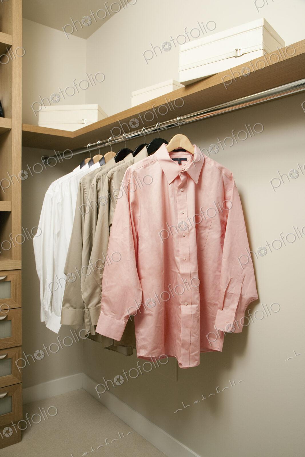 Closet with a rail of men’s shirts